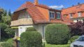 Seitenansicht mit Balkon & Terrasse